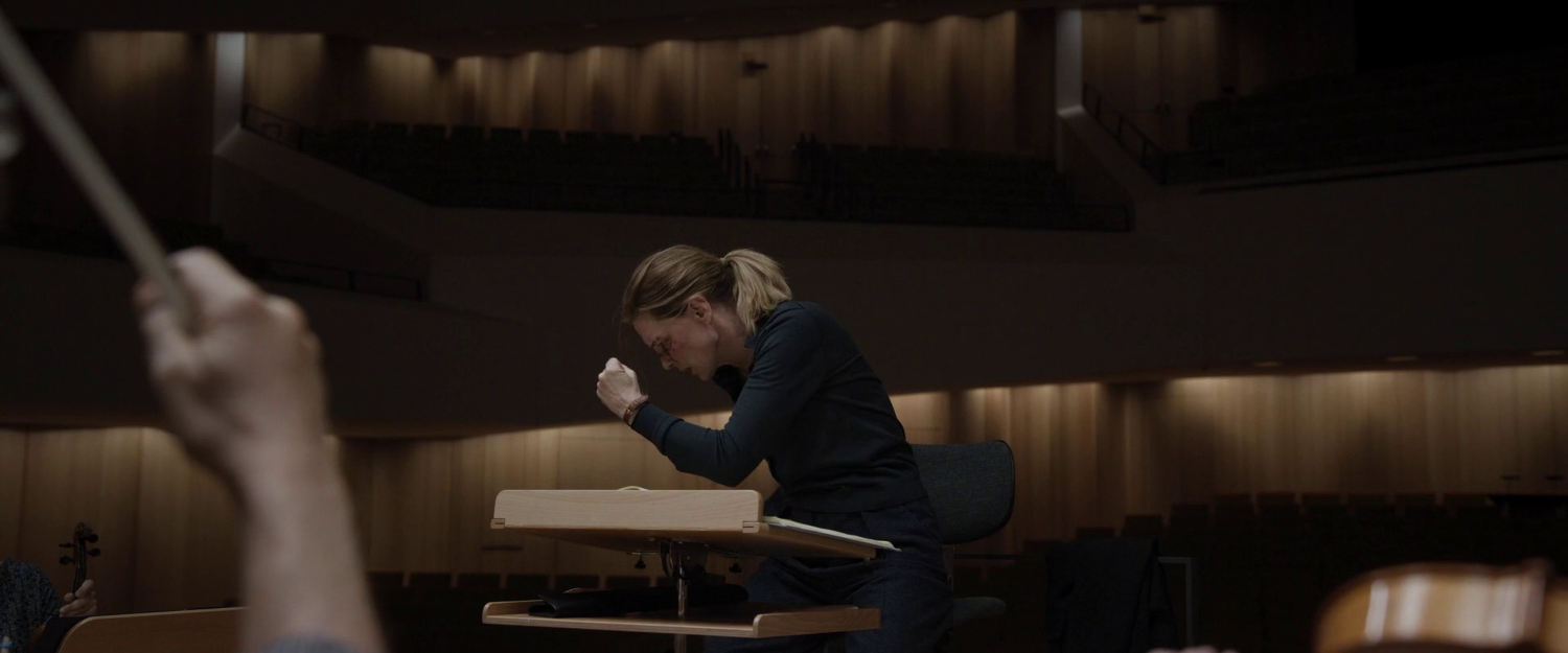 Woman in an auditorium