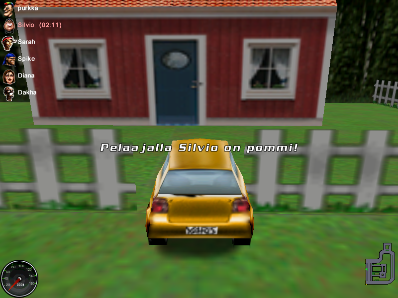 A car driving between some fences into an yard.